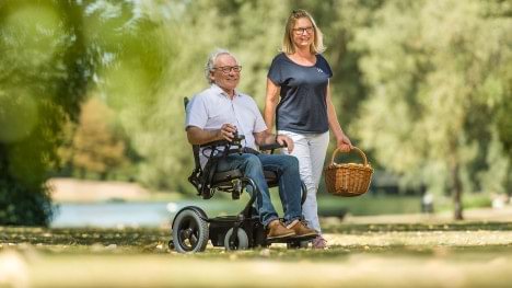 Harald walking on Wingus outside with his wife